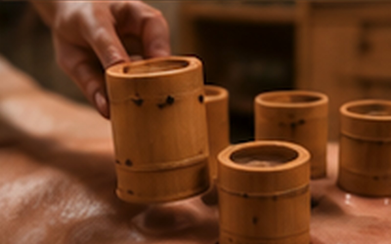 Representative bamboo cupping tools in a warm clinical treatment setting