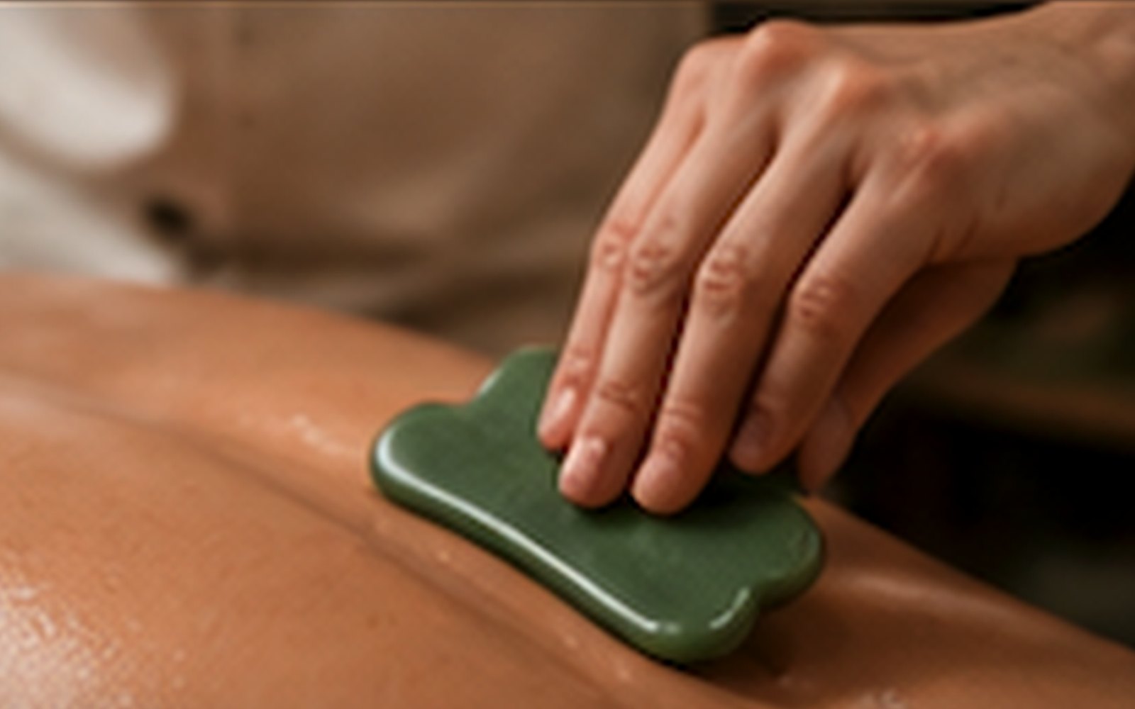 Representative gua sha tool used as soft tissue input